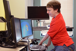 man using assistive technology to keyboard